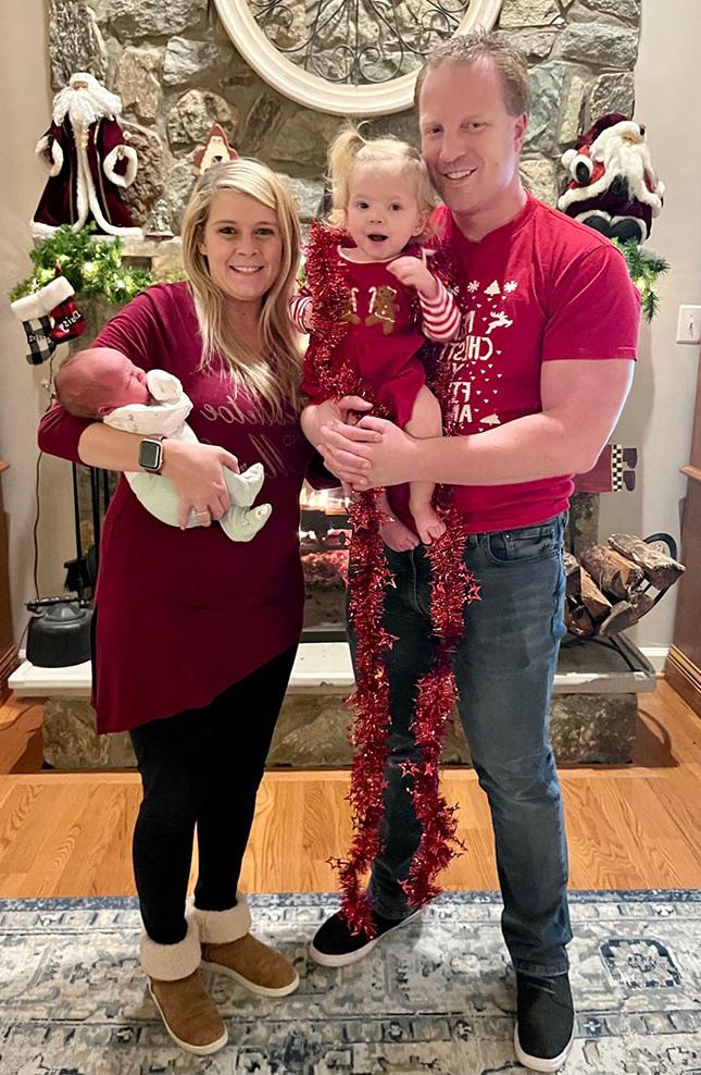 Darren Colananni and his wife Kristen with their children